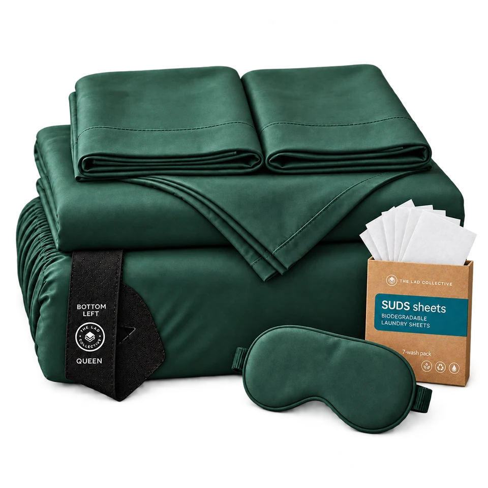 Product visualization of a folded green TLC sheet set with labeled corner loop, matching eye mask and laundry sheets