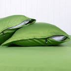 Paid of Colorado green pillowcases featuring signature invisible zip detail.