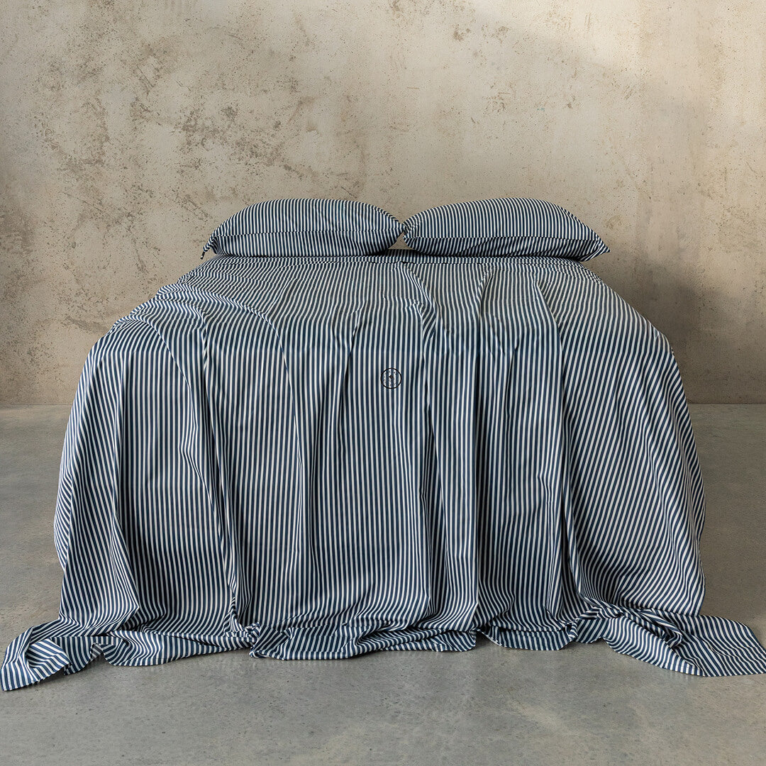 Navy and white pinstripe bedding set.