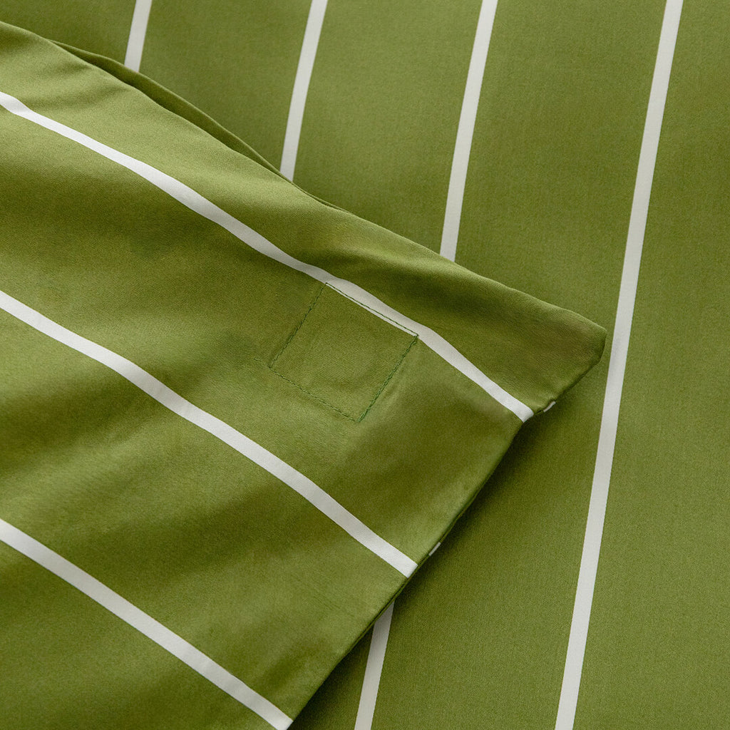Green fabric with white stripes and a pocket detail