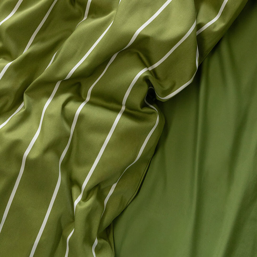 Close-up of green fabric with white stripes