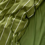 Close-up of green fabric with white stripes