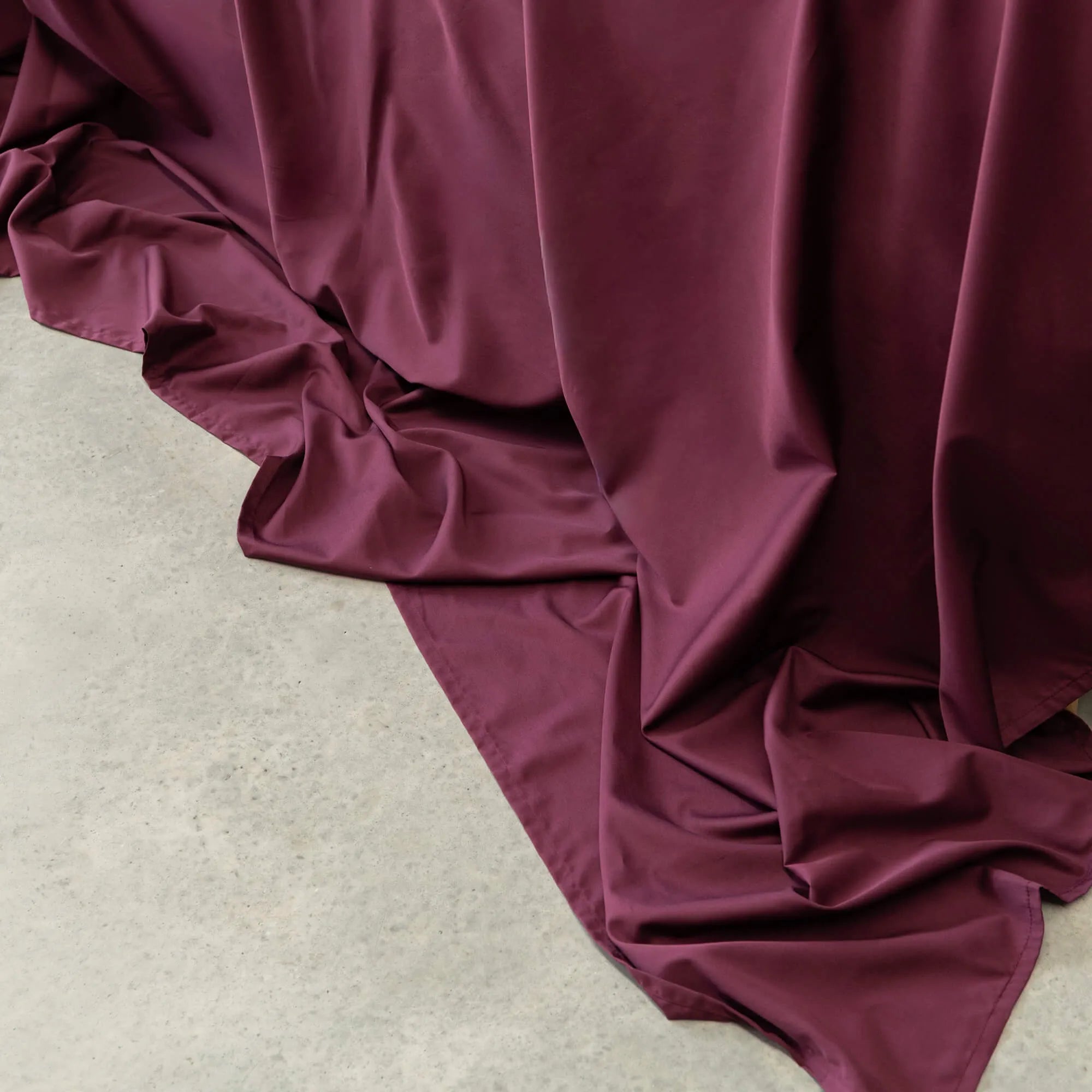 Close-up of a purple fabric draped over a surface