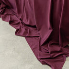  burgundy fabric with TLC 3.0 Bedding Set, conveying softness and joy.