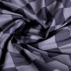 Checkered fabric pattern in shades of gray.