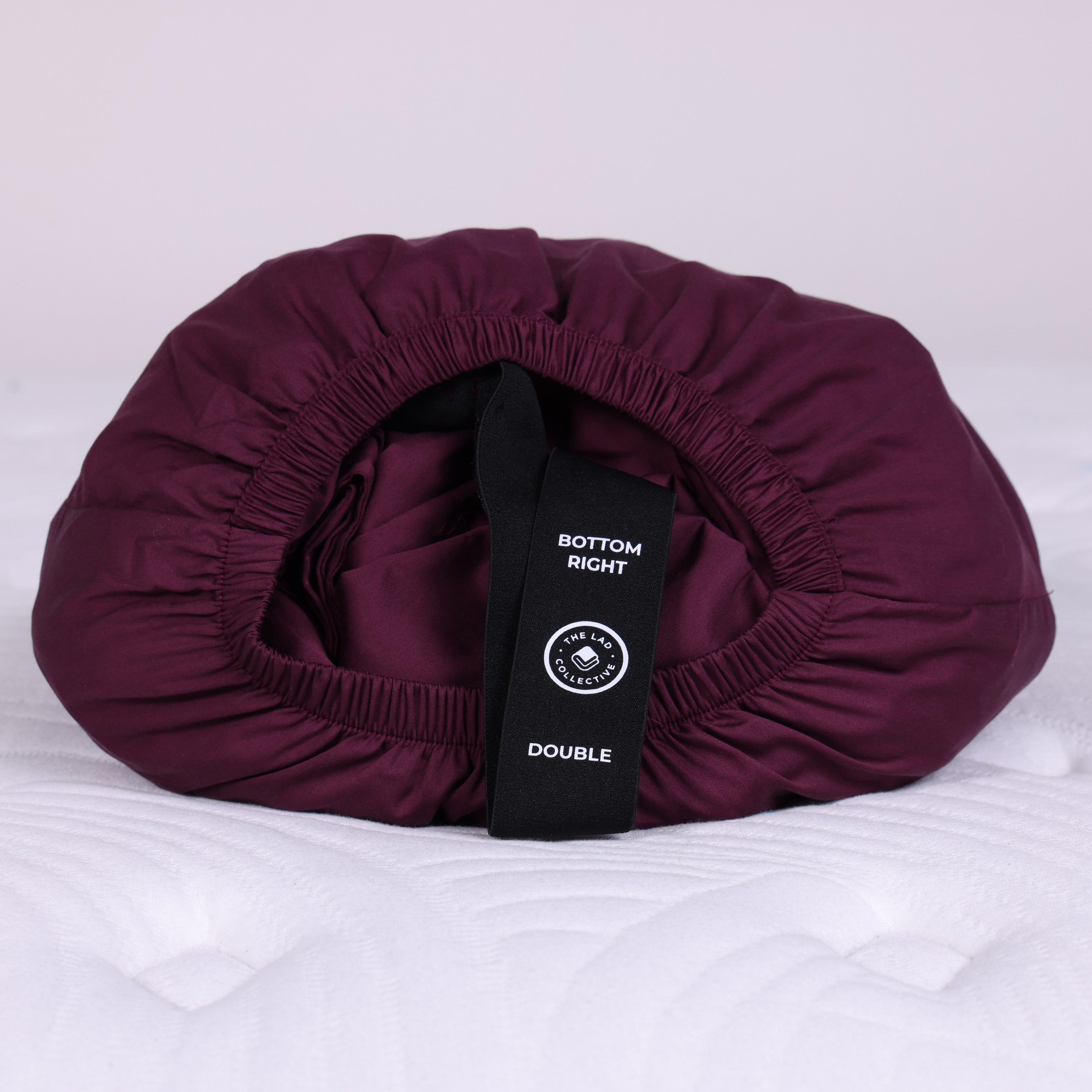 New England fitted sheet packed into Joey Pouch with Bottom Right Double label visible.