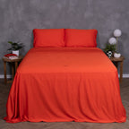 Full view of TLC Red Rock bedding set with styled bedside tables and vibrant desert-inspired design.