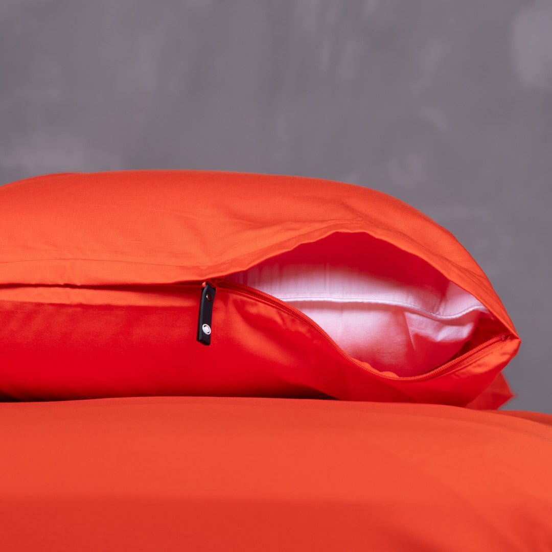 Close-up of TLC Red Rock pillowcase showing invisible zipper and premium stitching.