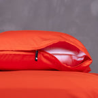 Close-up of TLC Red Rock pillowcase showing invisible zipper and premium stitching.