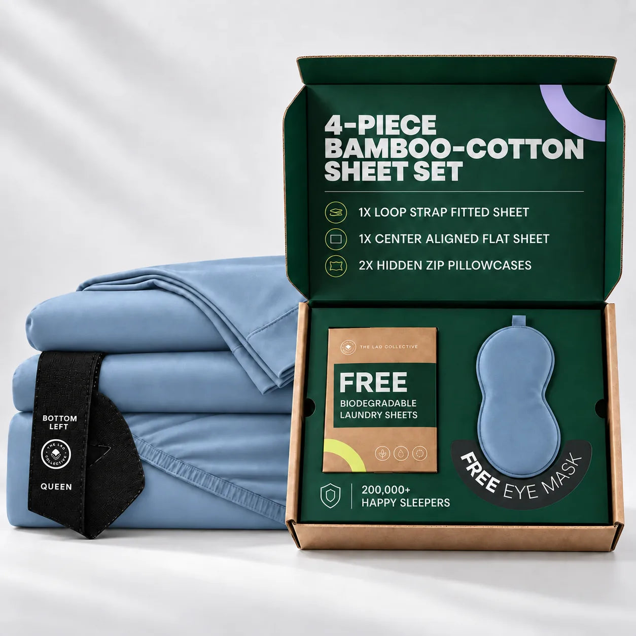 Folded Canyon Lake dusty-blue sheets and matching blue eye mask in a green gift box